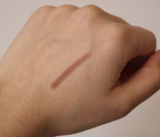 light brown lip liner on hand