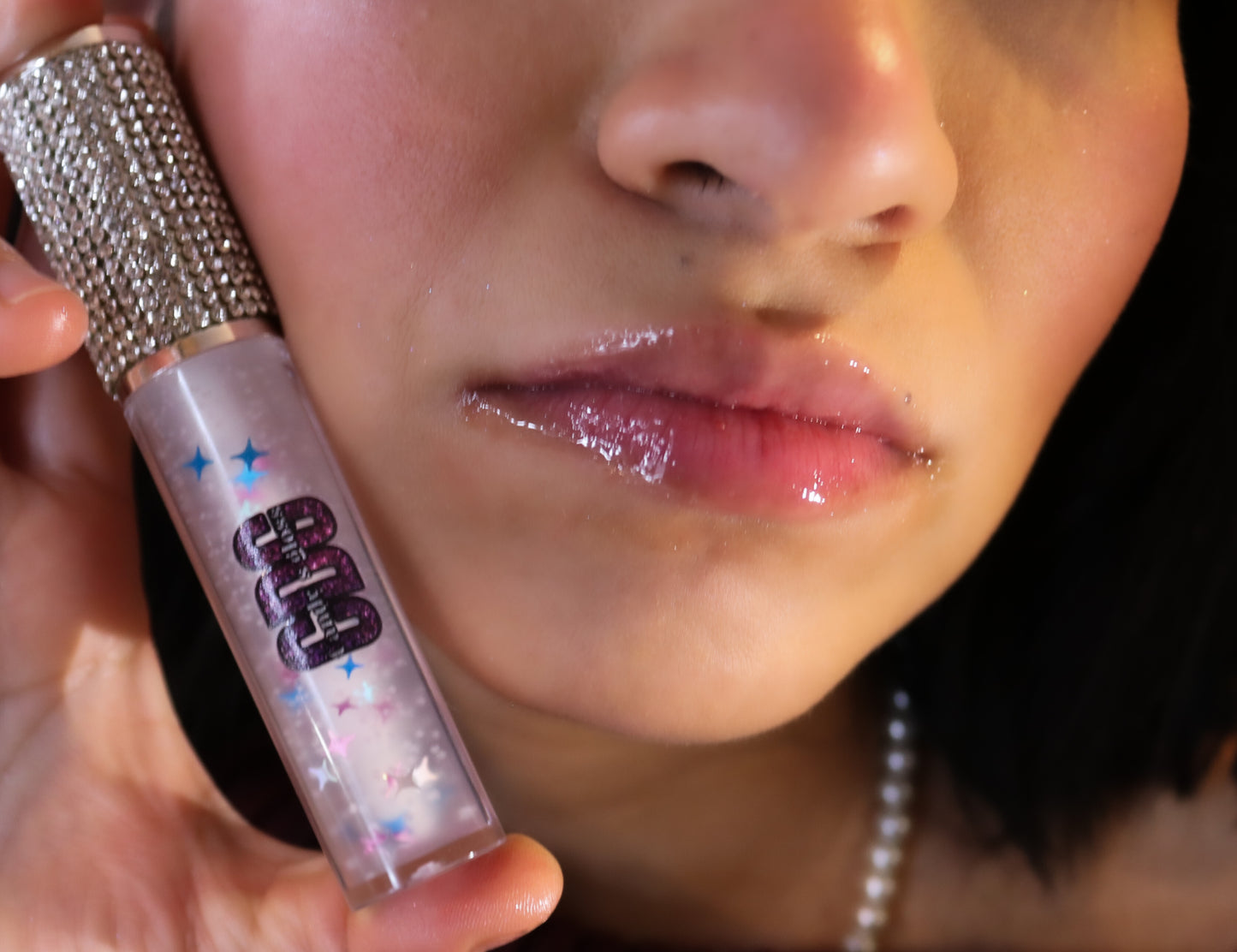 close up of clear lip gloss 