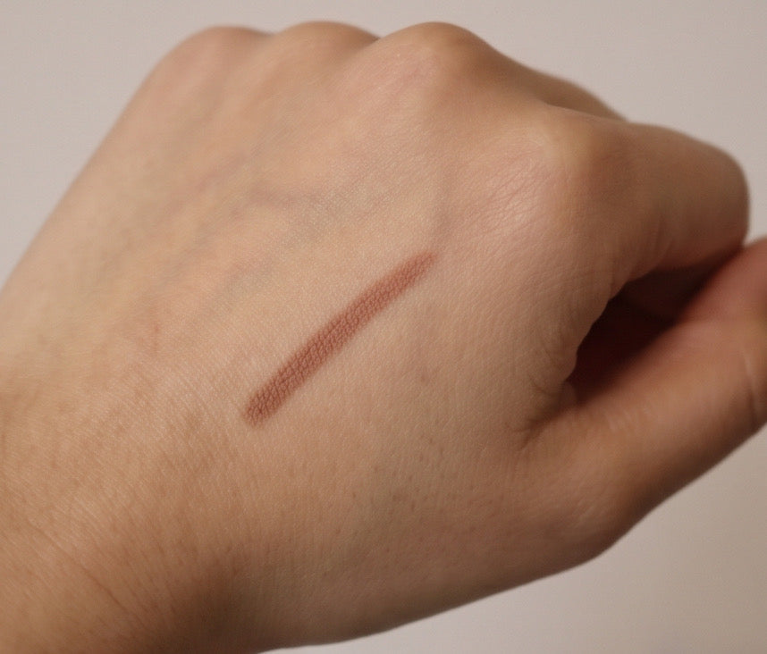 light brown lip liner on hand